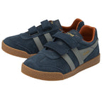 Two navy blue velcro shoes with brown soles are positioned together on a white background.