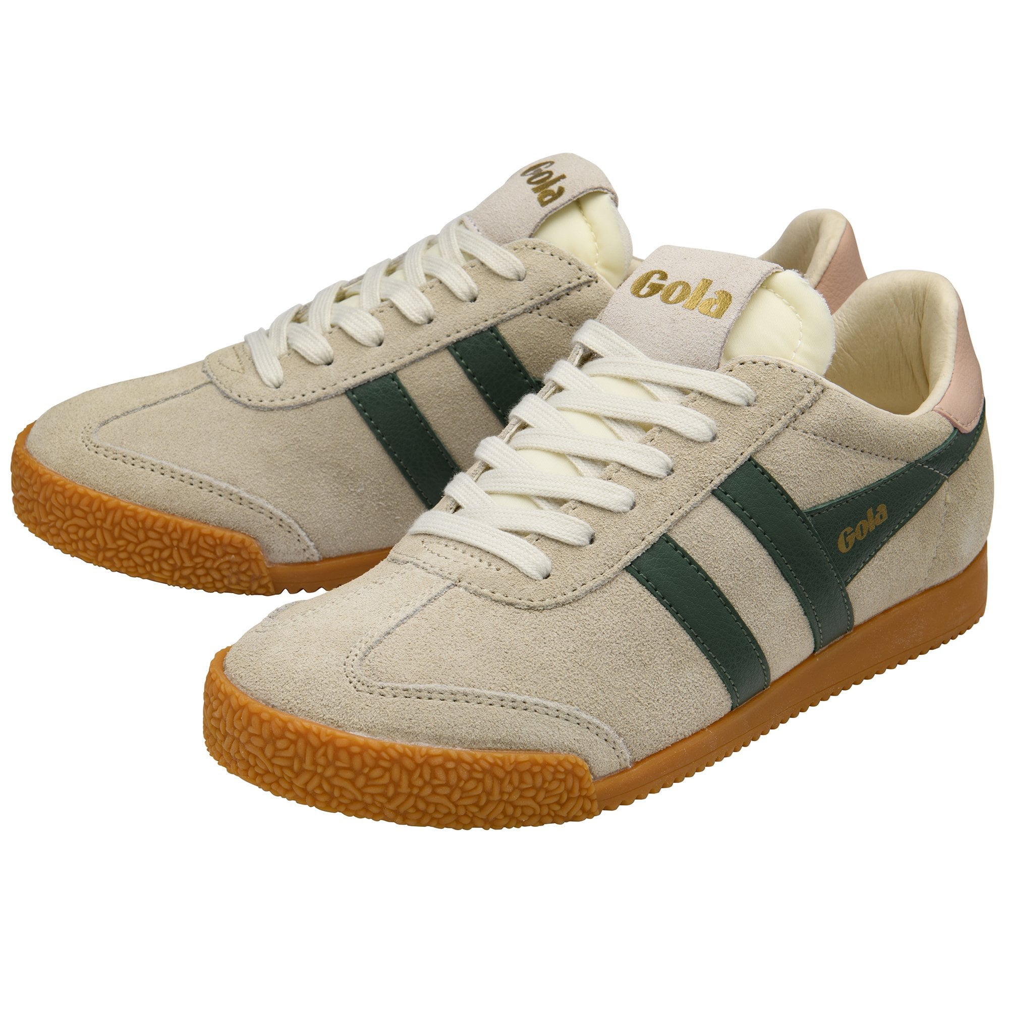 Two Gola low-top sneakers in off-white with dark green stripes and gum soles.