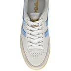 Top-down view of a white sneaker with light blue stripes and white laces.