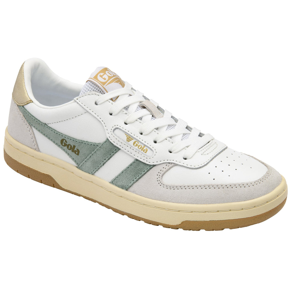 White and sage green Gola sneakers with gold accents and a gum sole.