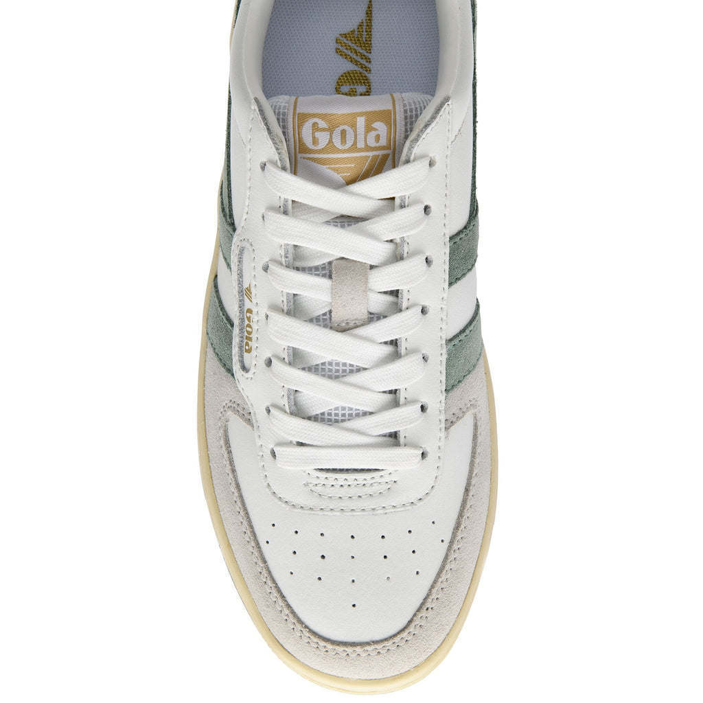 White Gola sneakers with green stripes and gold logo.