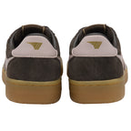 Rear view of two dark brown sneakers with light brown soles and a gold logo on the heel.