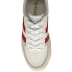 Top-down view of a white Gola sneaker with red stripes and white laces.
