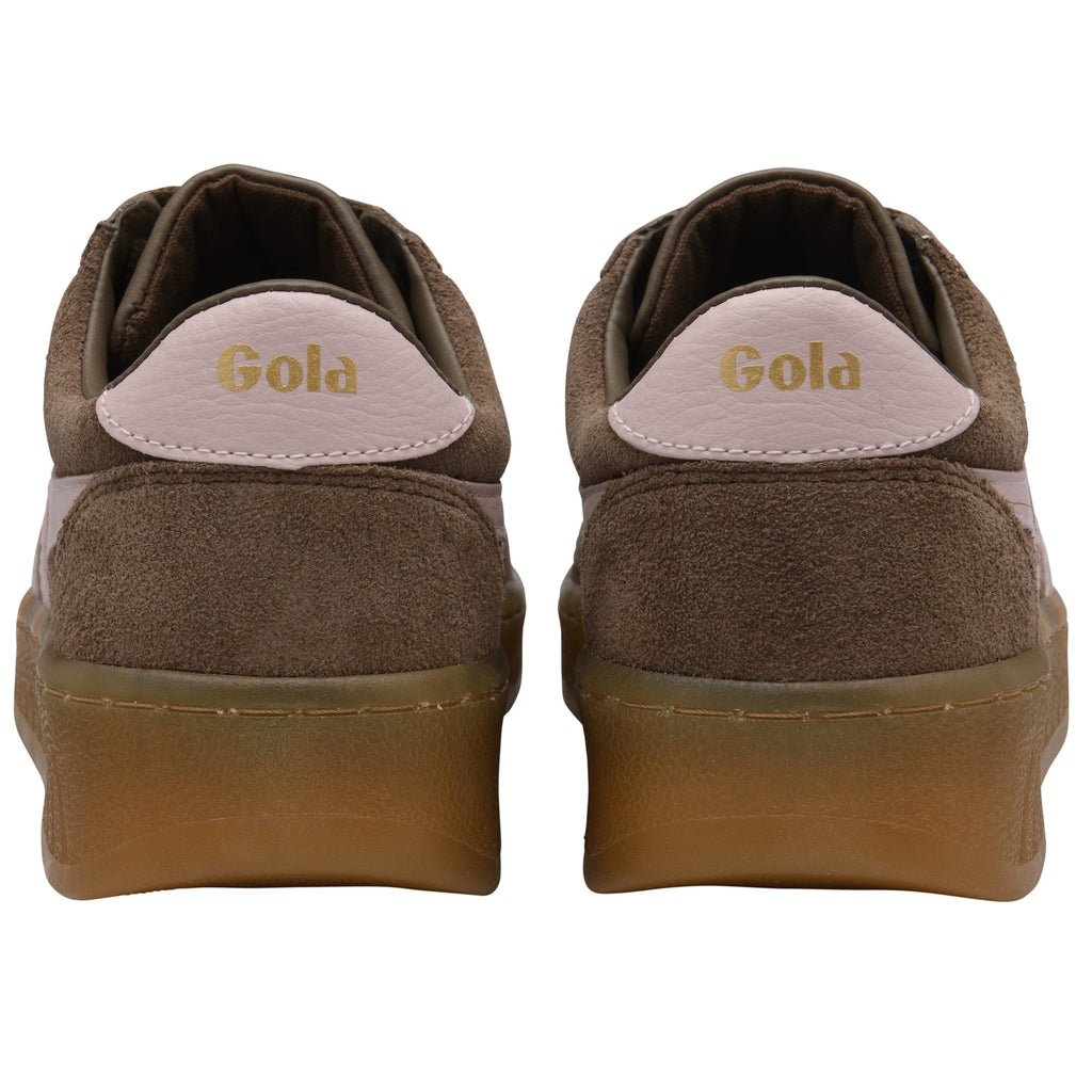 Pair of brown suede Gola sneakers with pink heel tabs and gold lettering.