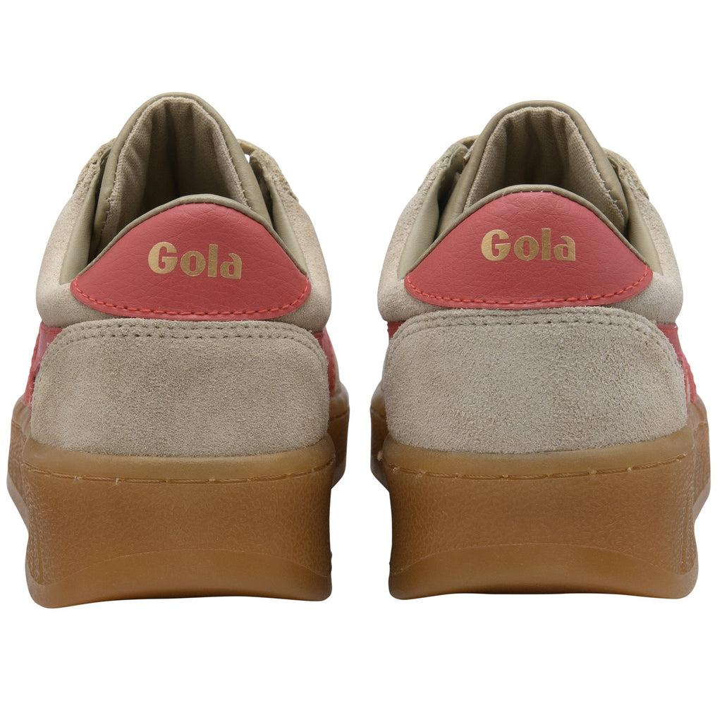 Back view of two Gola sneakers with beige suede and red accents.