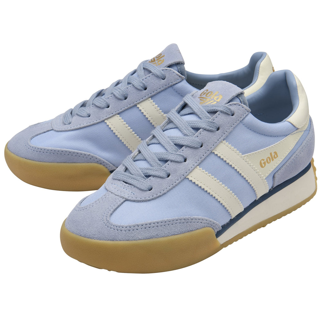 Pair of light blue Gola sneakers with white stripes and gum soles.