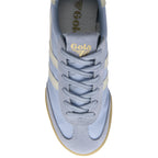 Top-down view of a light blue Gola sneaker with white stripes and gold branding.