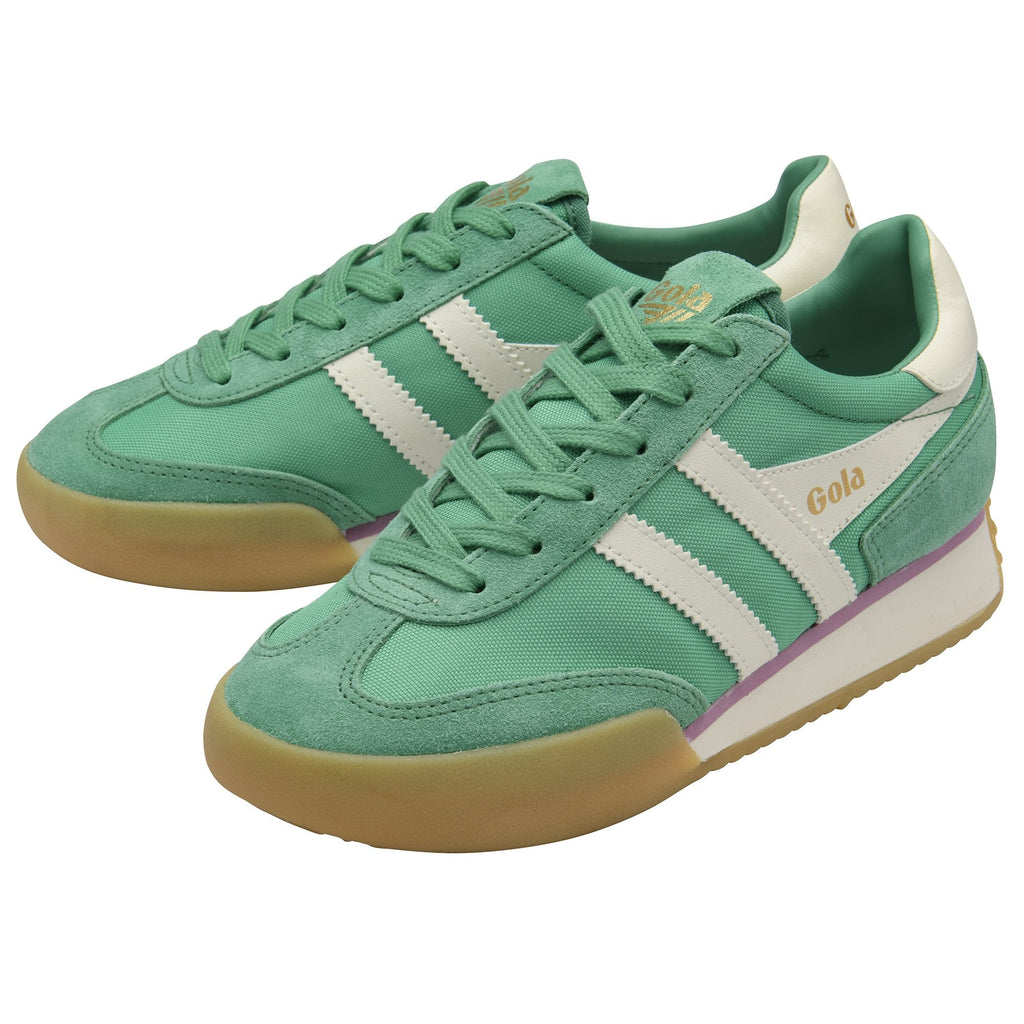 Pair of green and white Gola sneakers with brown soles.