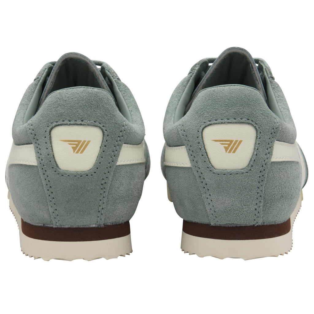 Back view of two light green suede sneakers with white stripes and a gold logo on the heel.
