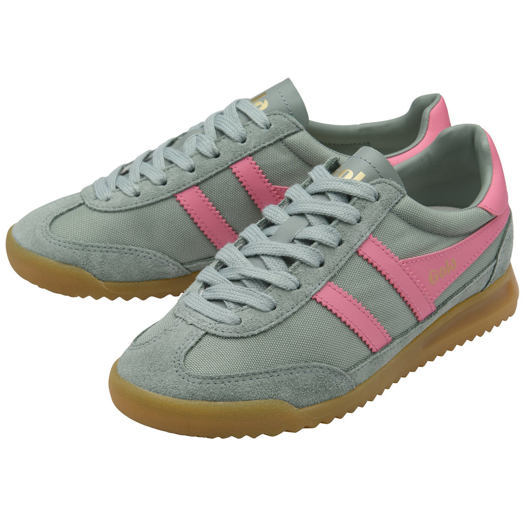 Pair of grey suede sneakers with pink stripes and gum soles.