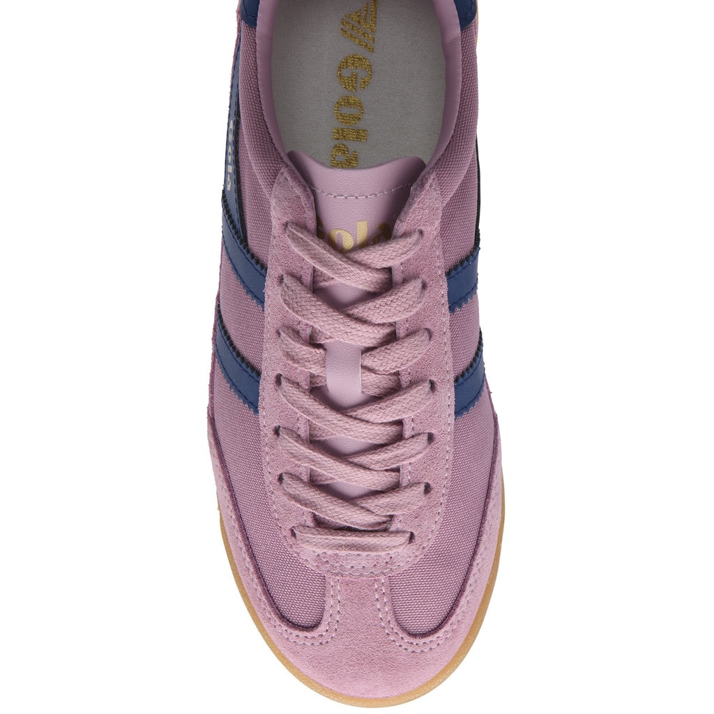 Top-down view of a dusty pink sneaker with dark blue stripes and laces.