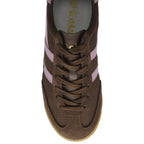 Top-down view of a brown suede sneaker with three light pink stripes on the side.