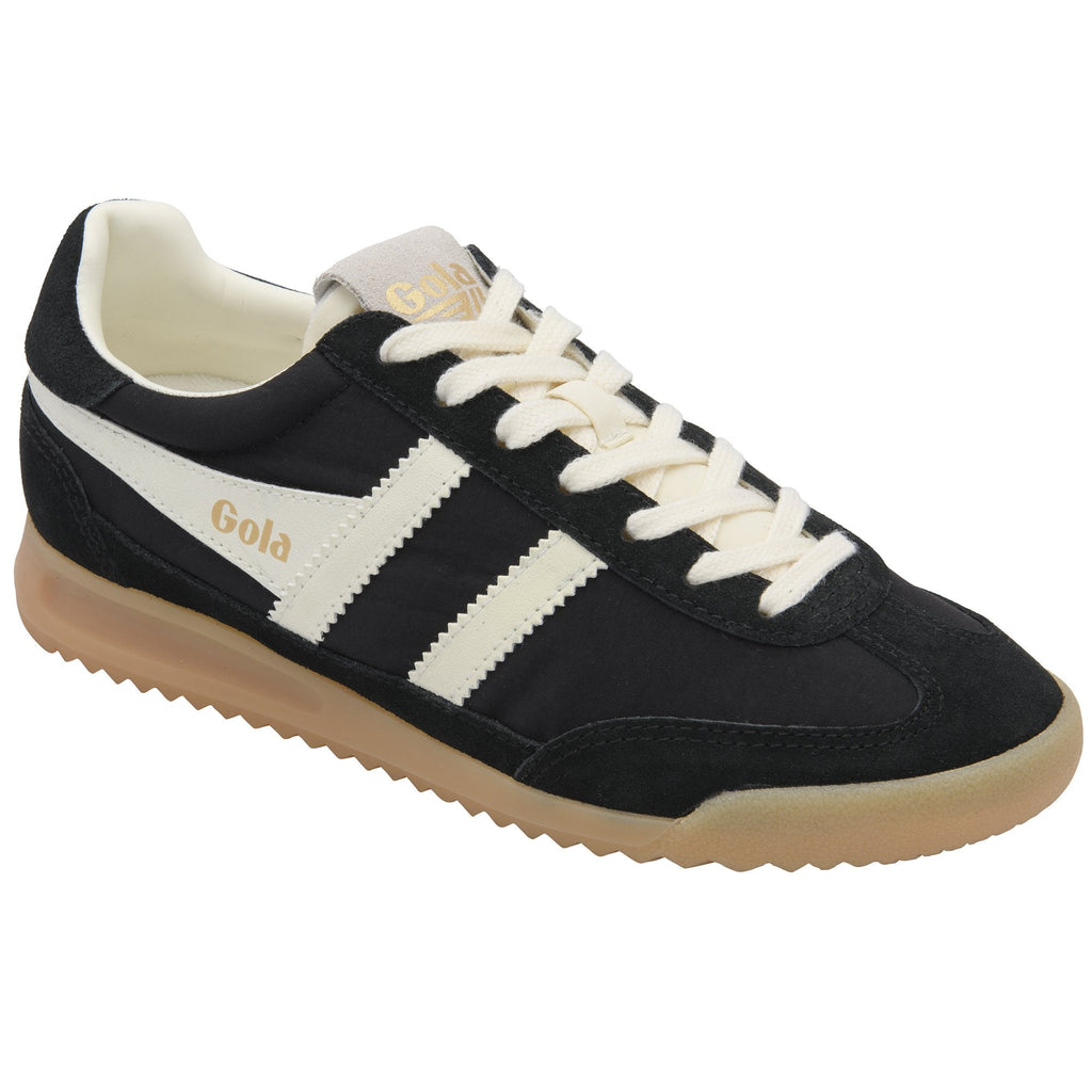 Black Gola sneakers with white stripes and cream laces on a gum sole.
