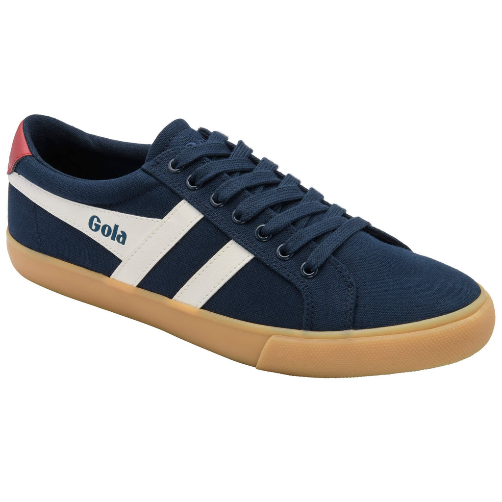 Navy blue trainer with white stripe and red accents on a white background