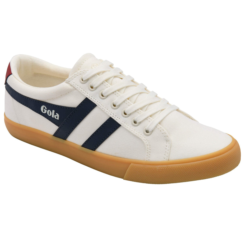 White trainer with a navy stripe and brown sole on a white background