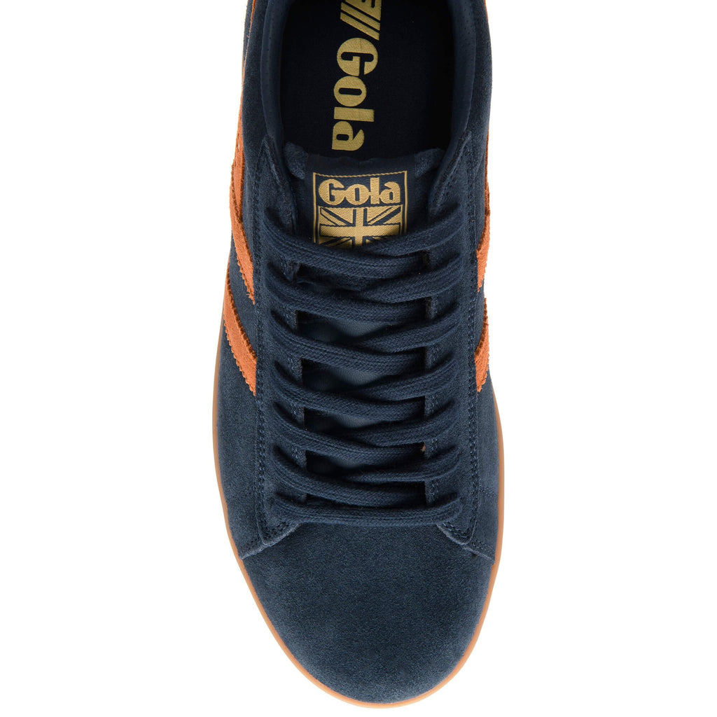 Navy blue Gola trainer with orange stripes and a gum sole