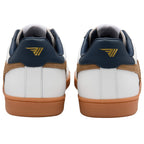Pair of white trainers with brown suede accents, navy blue heel tabs with a gold logo, and gum soles