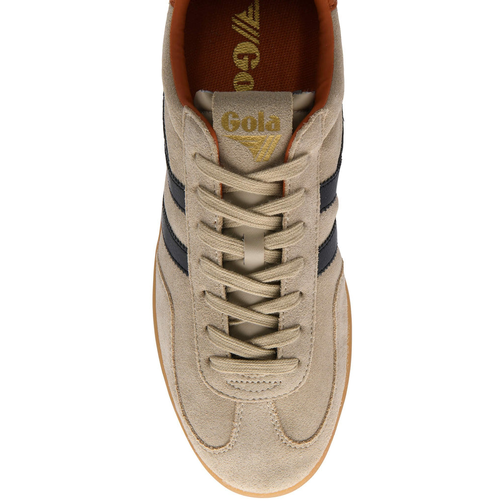Beige trainer with navy stripes on a white background