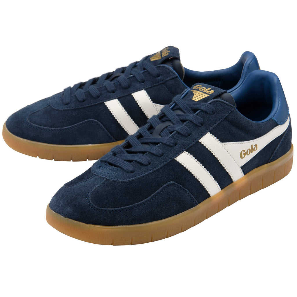 Pair of Gola sneakers in navy blue suede with white stripes and gum soles