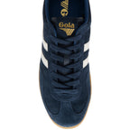 Navy blue trainer with white stripes and 'Gola' branding on a white background