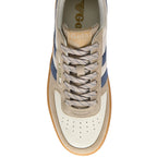 Beige and blue trainer with Gola logo on a white background