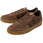 Brown suede trainers with tan soles on a white background