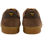 Brown suede trainers with gold accents on a white background
