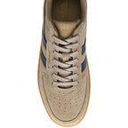 Beige trainer with blue stripes on a white background