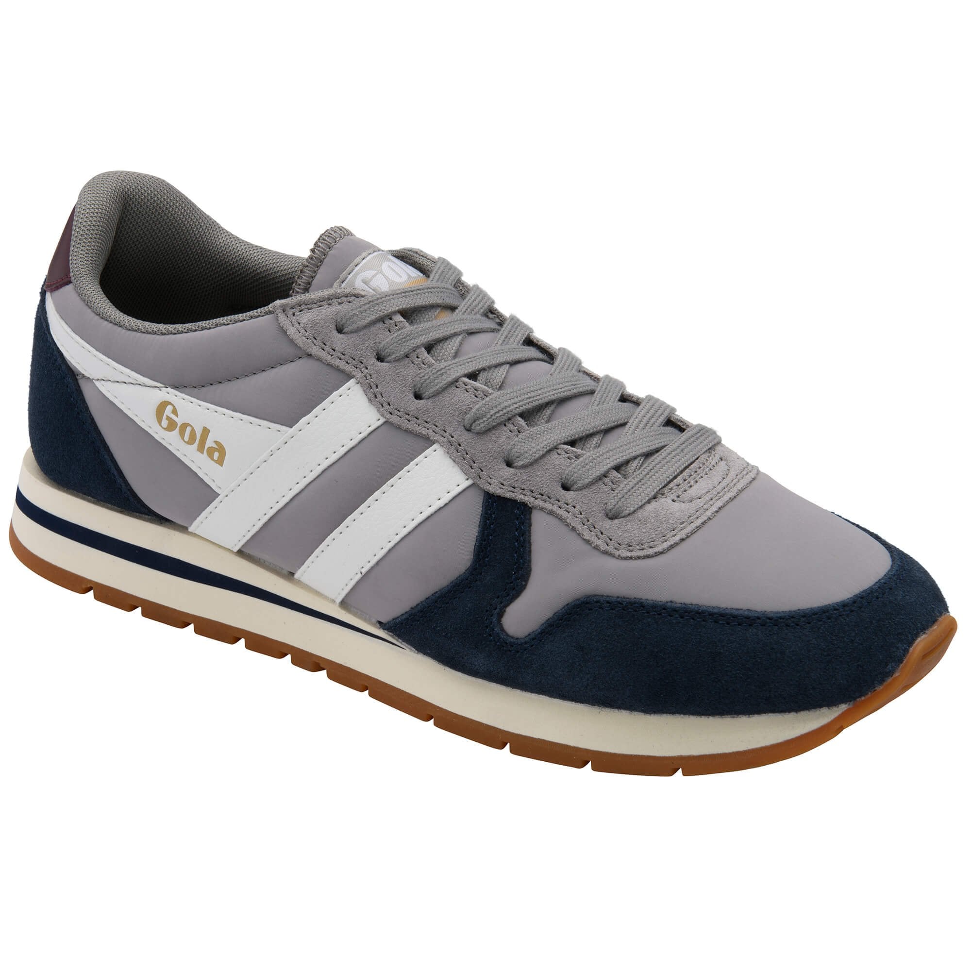 Grey and navy trainer with white accents on a white background