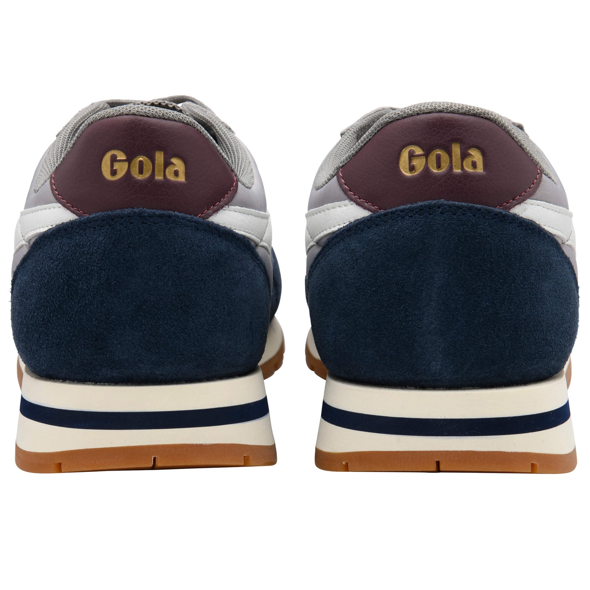Pair of Gola trainers, rear view, with navy suede, white and grey uppers, and a maroon heel tab with gold Gola logo
