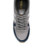 Top down view of a grey and navy Gola trainer with white stripes and grey laces