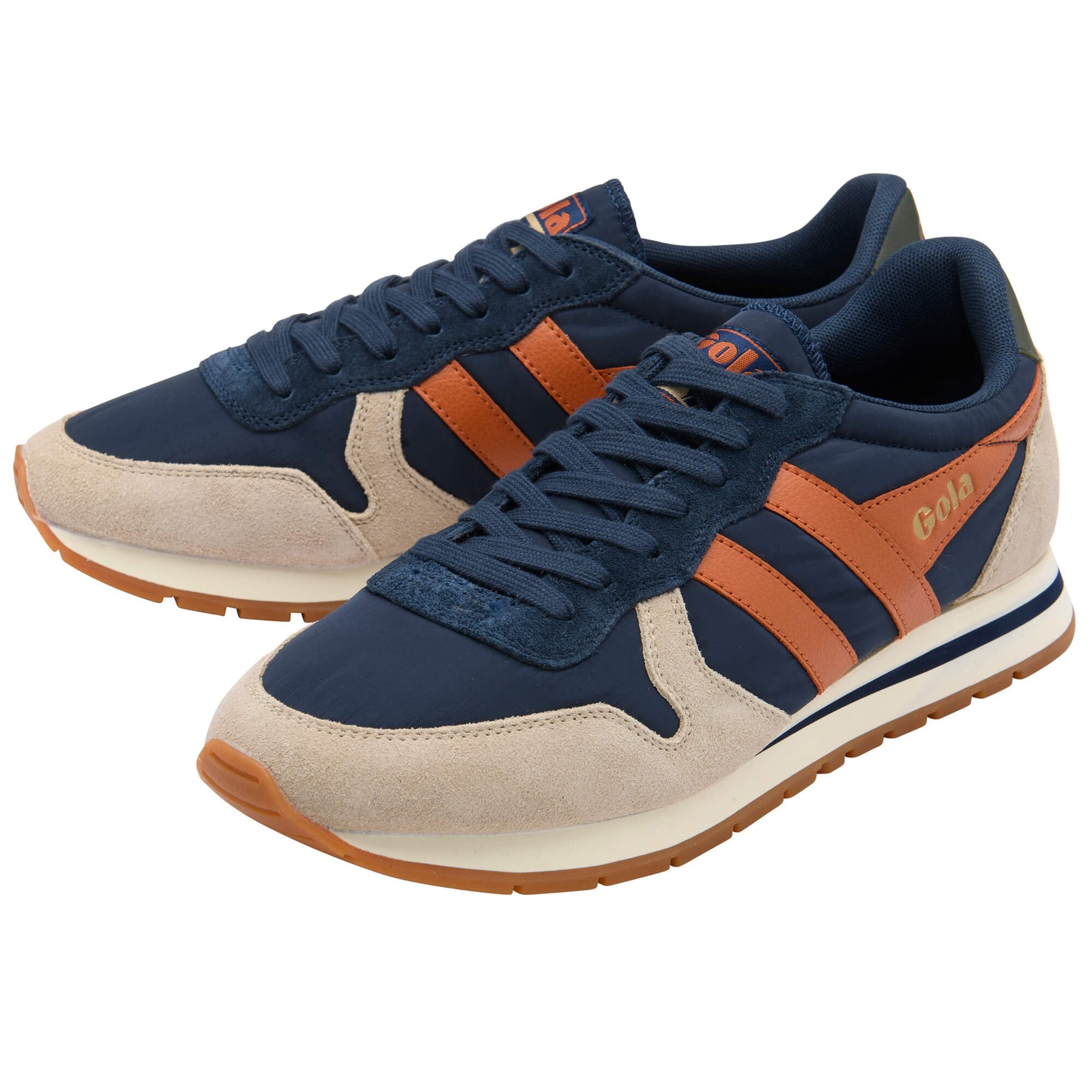 Navy and beige trainers with brown accents on a white background