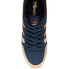 Navy blue trainer with orange accents on a white background