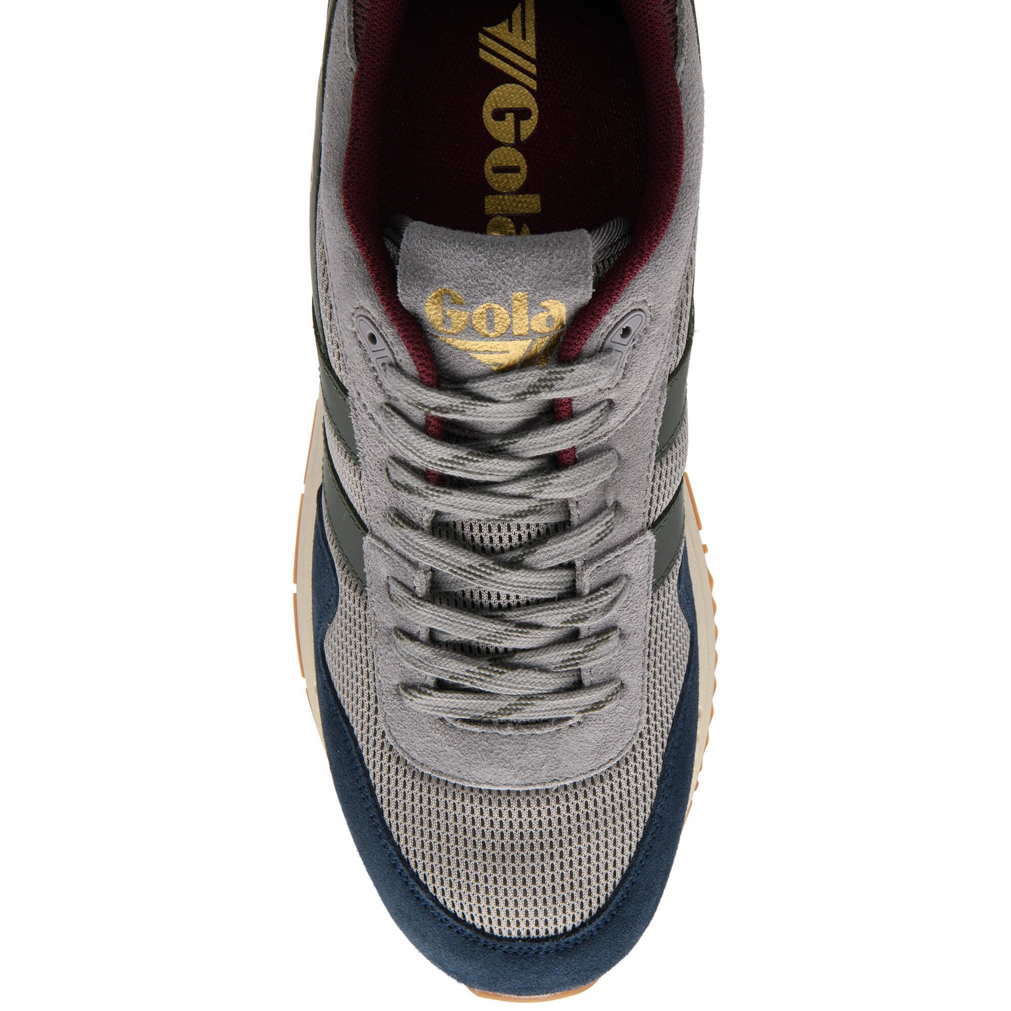 Grey trainer with blue accents and gold logo on a white background