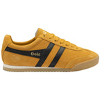 Yellow Gola trainer with black stripes on a white background