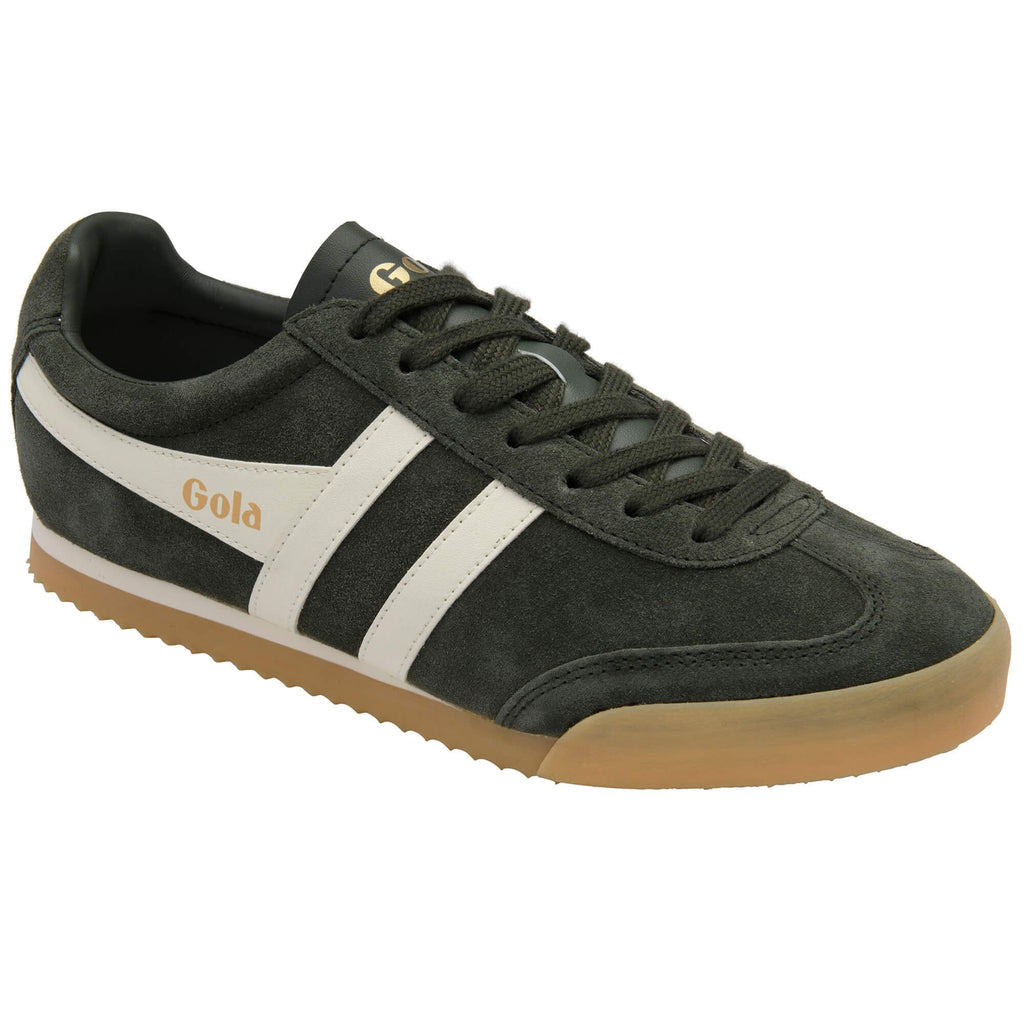 Green trainer with white stripe and brown sole on a white background