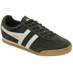 Green trainer with white stripe and brown sole on a white background