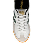 White trainer with green stripes and gum sole on a white background