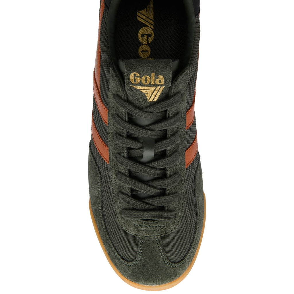 Green trainer with brown accents on a white background