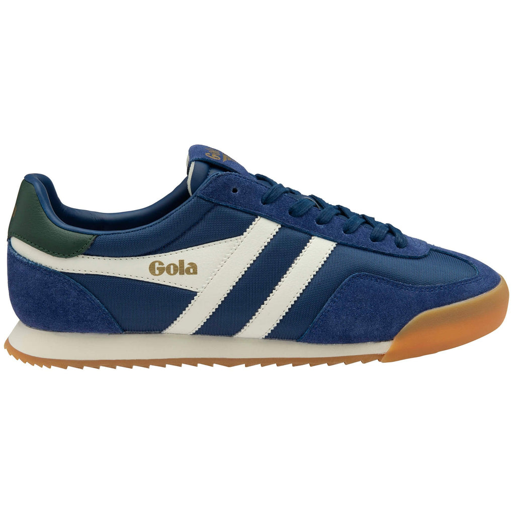 Blue Gola trainer with white stripes and a gum sole