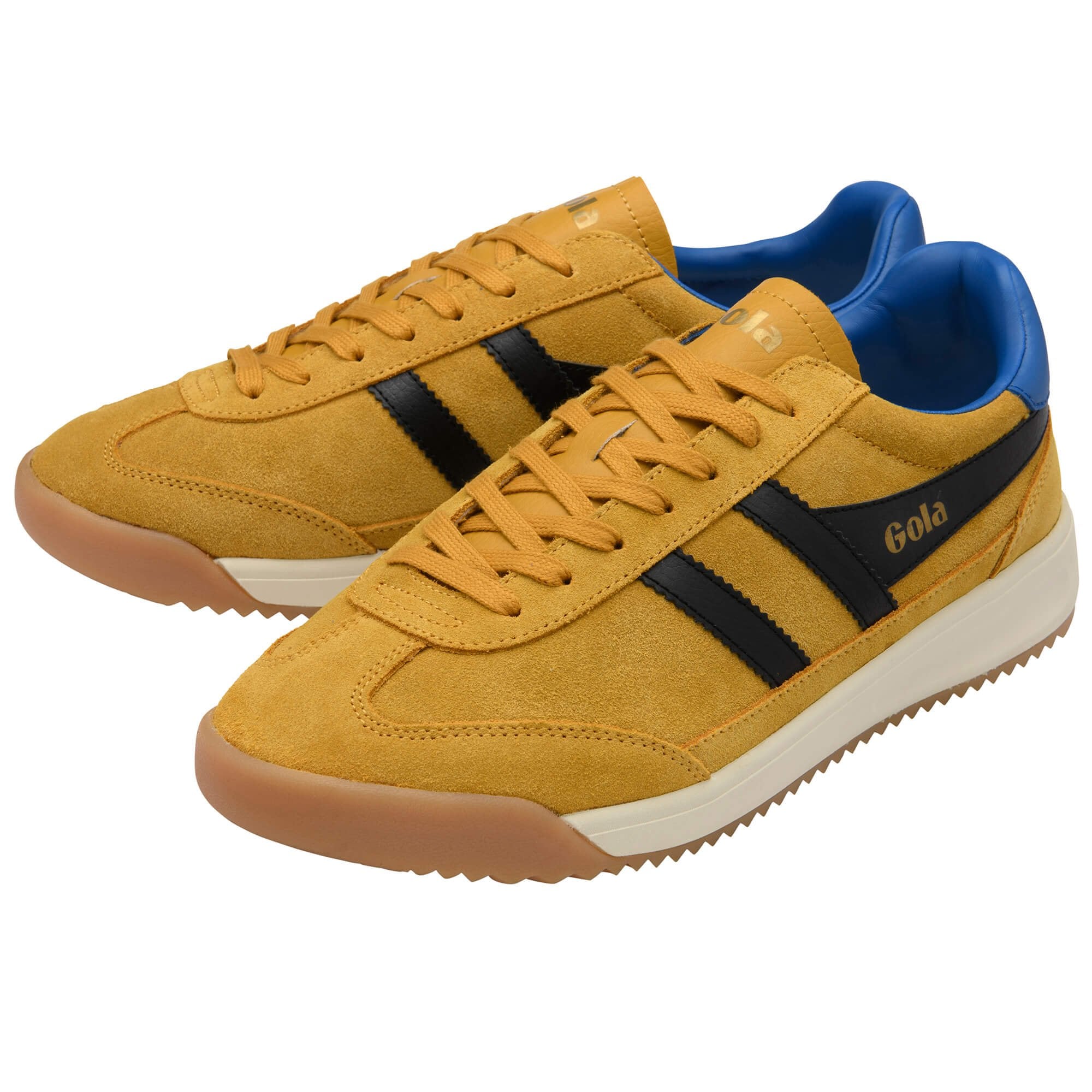 Yellow trainers with black stripes and blue lining on a white background