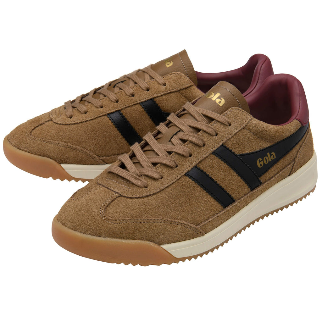 Brown trainers with black stripes and Gola logo on a white background