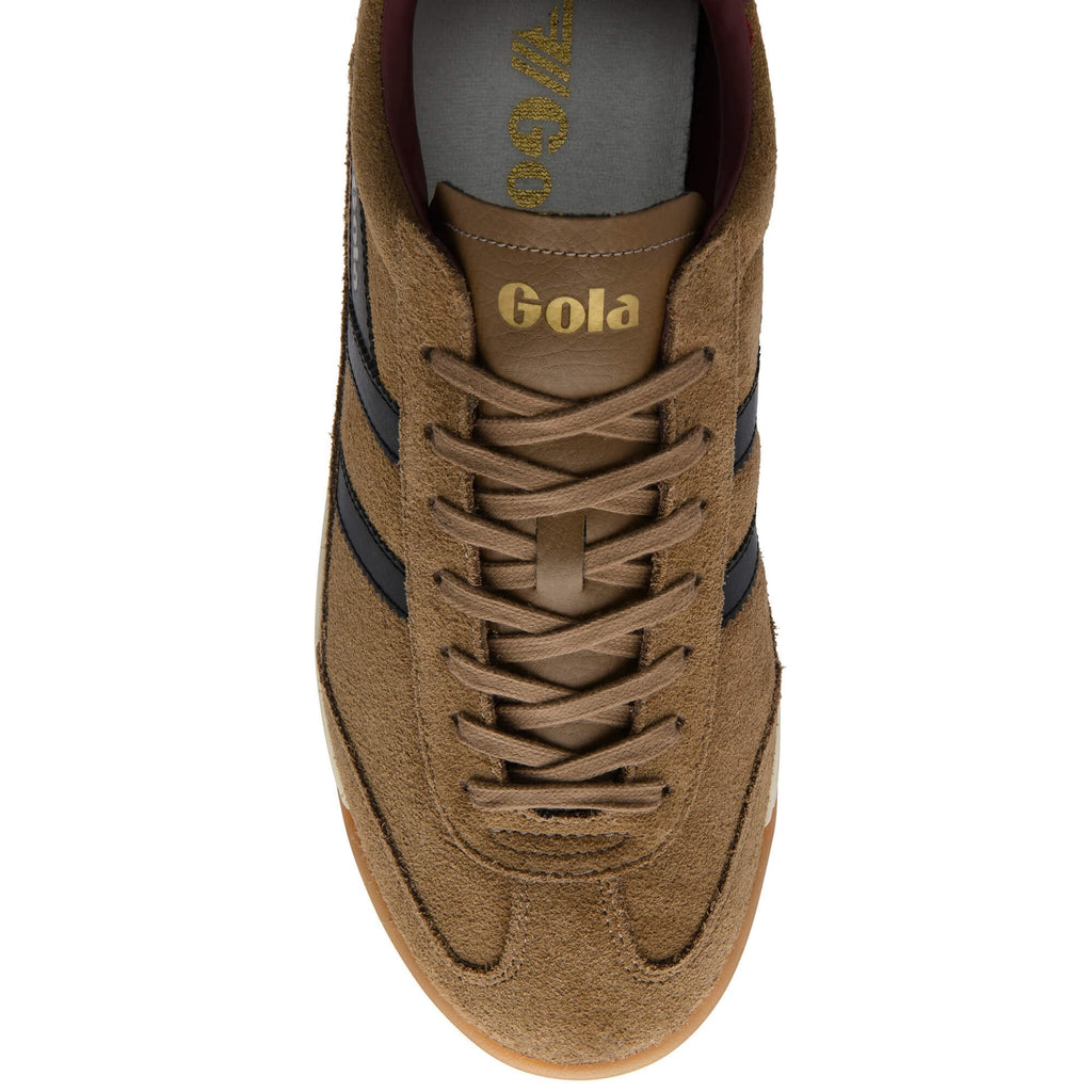 Brown trainer with black stripes and 'Gola' branding on a white background