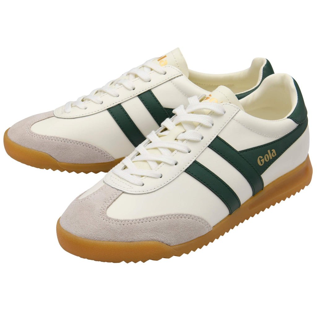 Pair of white Gola sneakers with dark green stripes and tan soles.