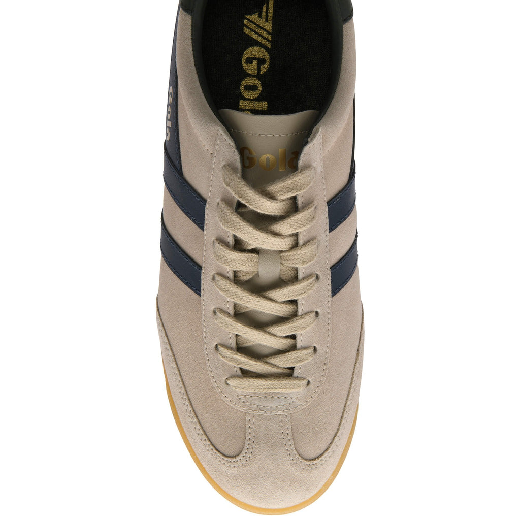 Top-down view of a beige Gola trainer with navy stripes and laces