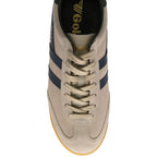 Top-down view of a beige Gola trainer with navy stripes and laces