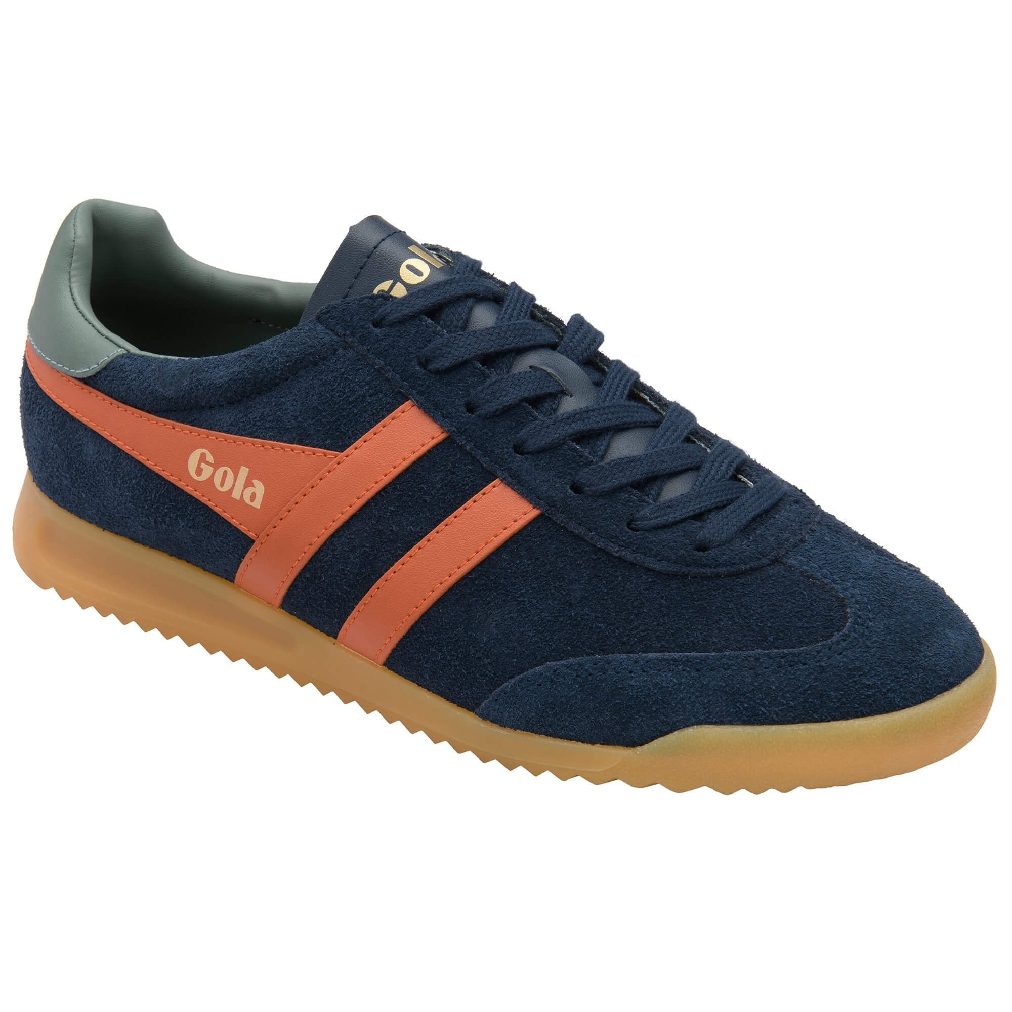 Navy blue trainer with orange accents on a white background