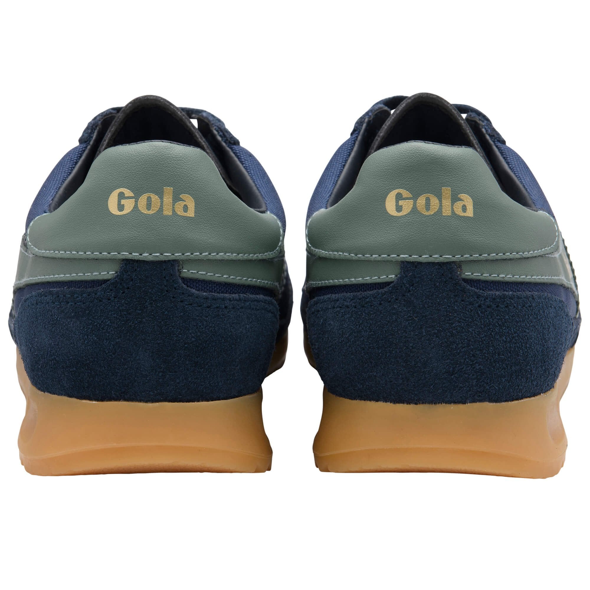 Navy and green Gola trainers with tan soles on a white background