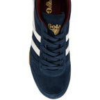 Navy Gola trainer with white stripes and gold Gola logo on the tongue