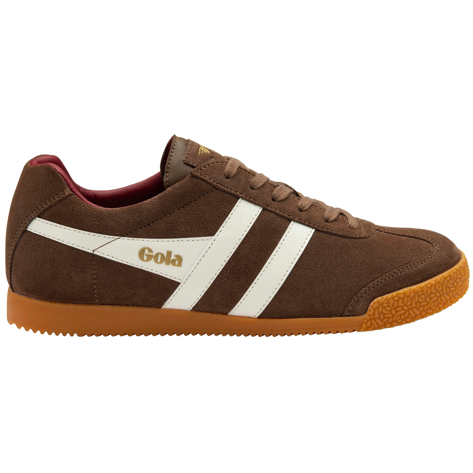 Brown trainer with white stripes and 'Gola' branding on a white background